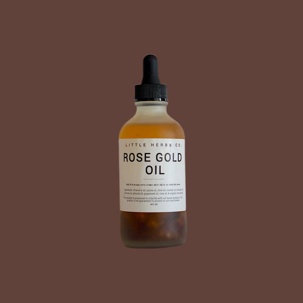 THE ROSE GOLD OIL